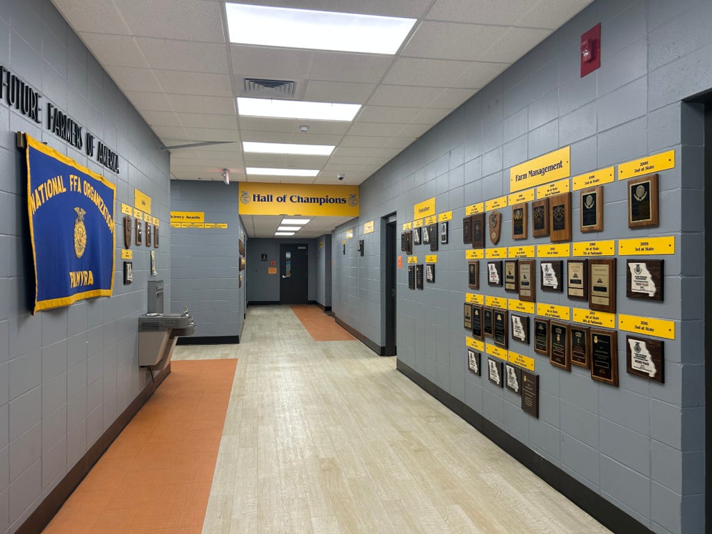 A section of Palmyra Ag Building‘s “Hall of Champions” display. Plaques include those of Wesley Summers’ state victories.