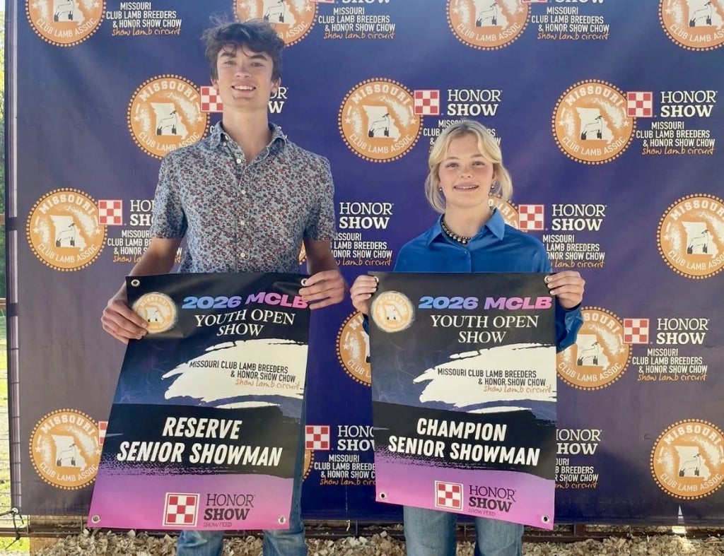 Summers pictured (left) with his Reserve Senior Showman award.