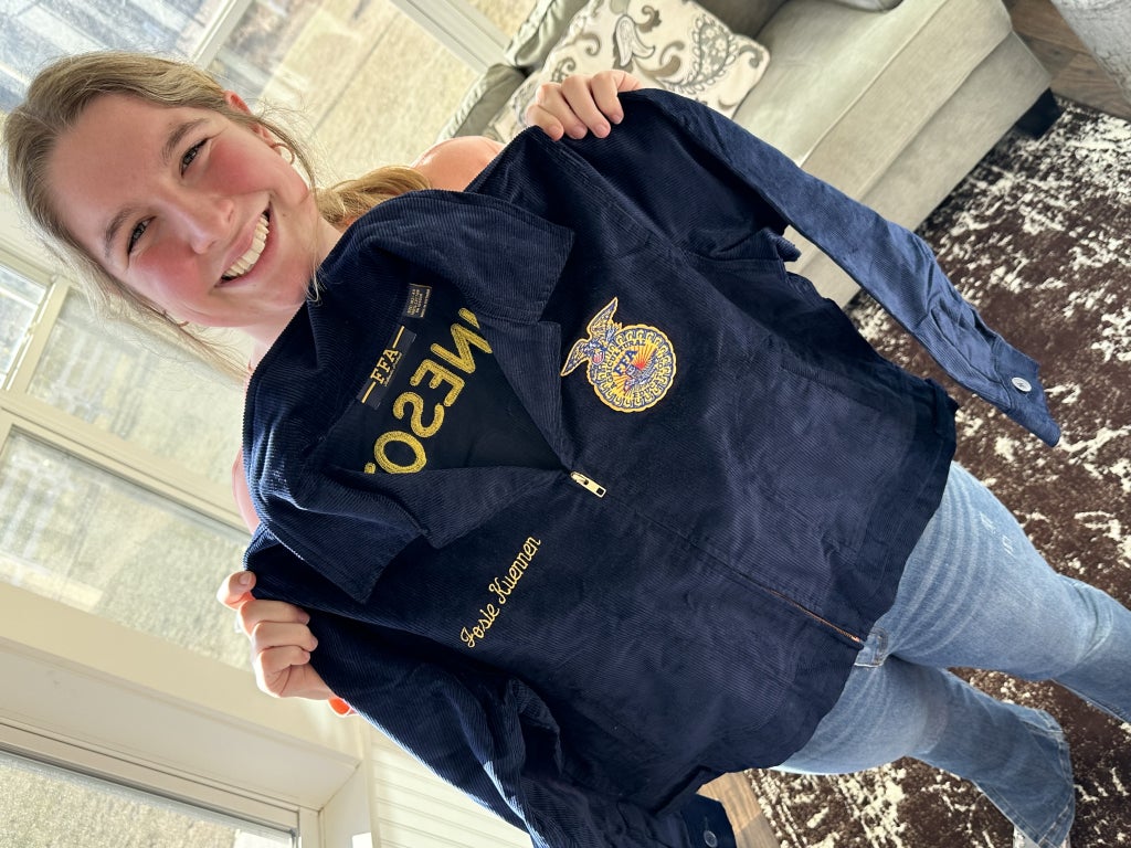 Josie Kuennen with her blue jacket award jacket.