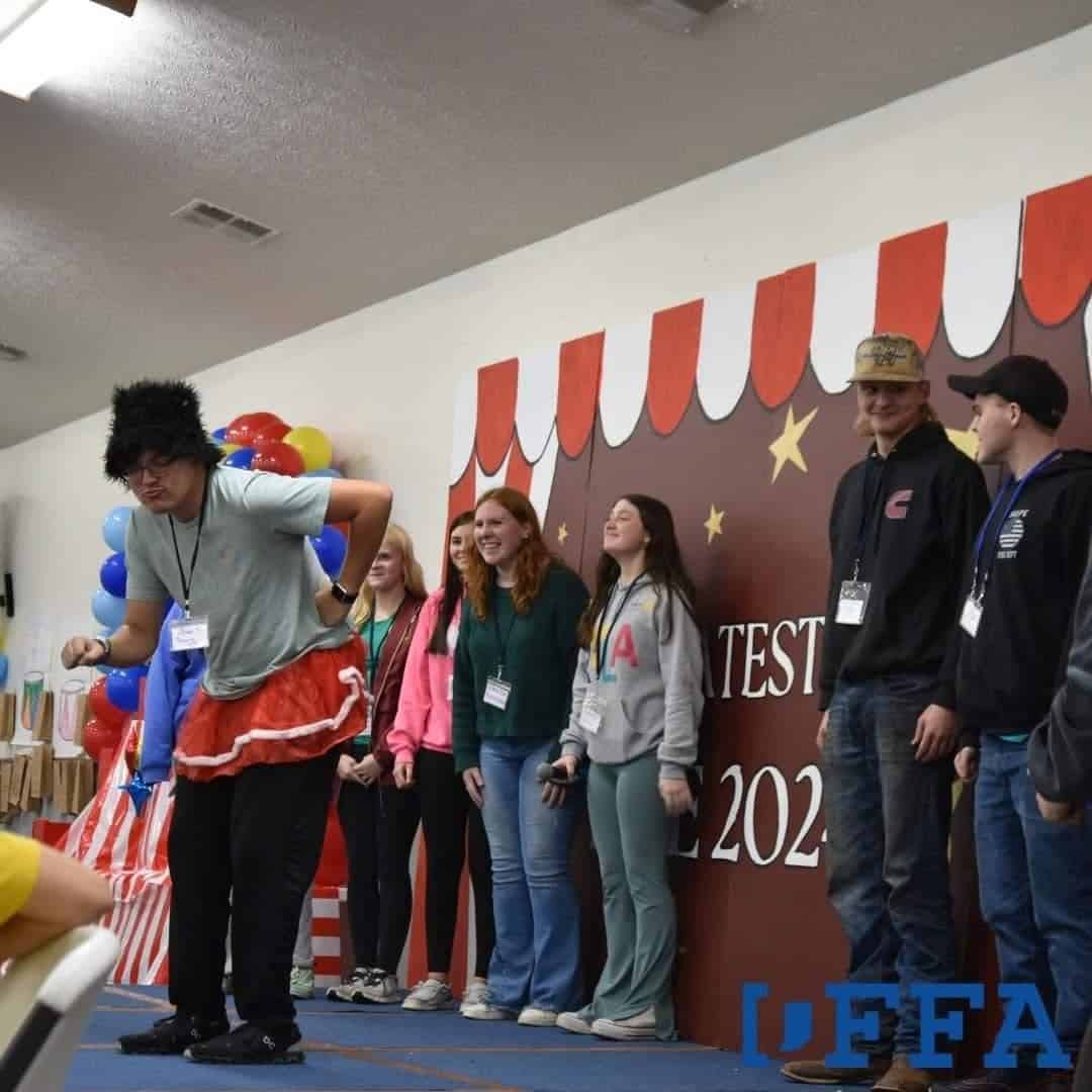 Ethan Sheets (on the left) performing at talent show at an Indiana FFA conference.