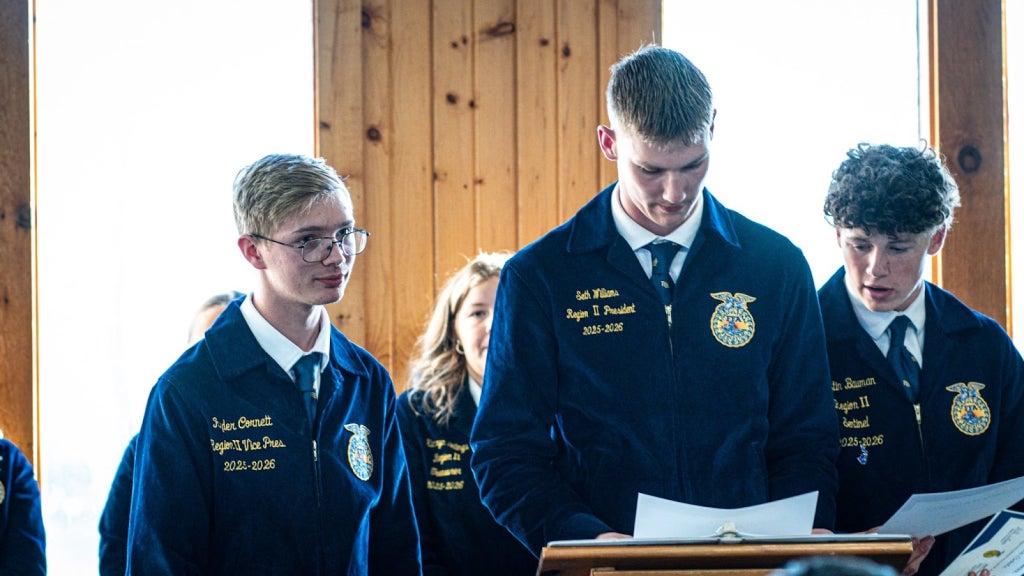 Ryder Cornett, Region II vice president (left), and Seth Williams, Region II president (right), announcing awards at the Annual Region II Banquet.