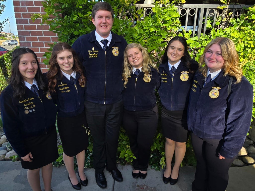 Susanville FFA parliamentary procedure team members before going in and competing at state finals.