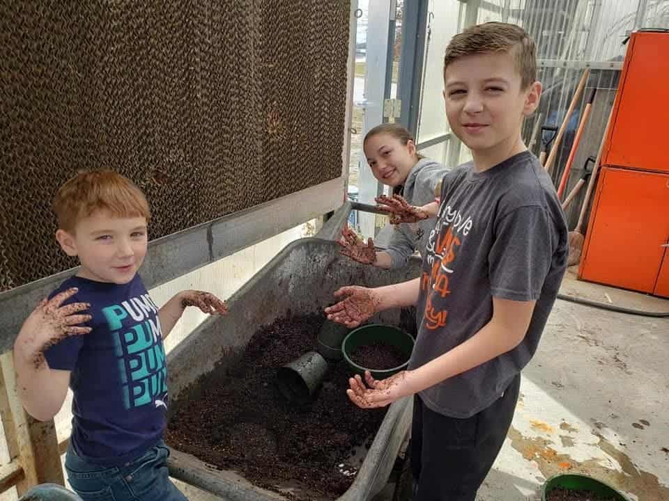 In the Cookeville FFA greenhouse, helping with the planting, with my brother, Bryce Vester, and another advisor’s kid, Blake Johnson.