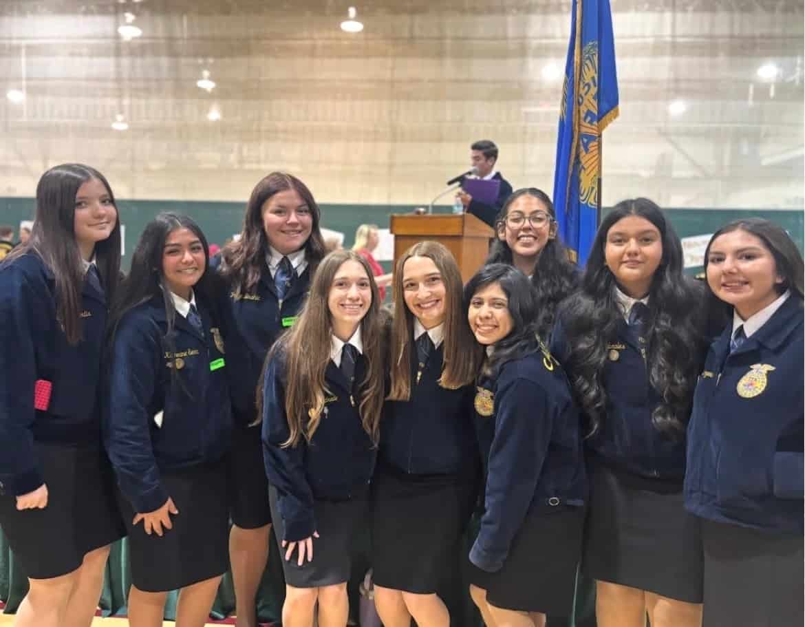 The Turlock FFA Chapter gathers around Maya Barnwell to celebrate her achievement. Left to right: Cayleigh Curtis, Katherine Serna, Paige Brahic, Isabella Andrade, Maya Barnwell, Alyx Barragan, Liliana Cabrales, Rubiana Cabrales and Annalilia Scroggins.