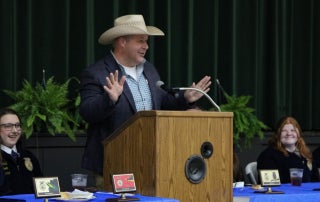 Commissioner Holt speaking at the inaugural Hollow Rock-Bruceton FFA banquet