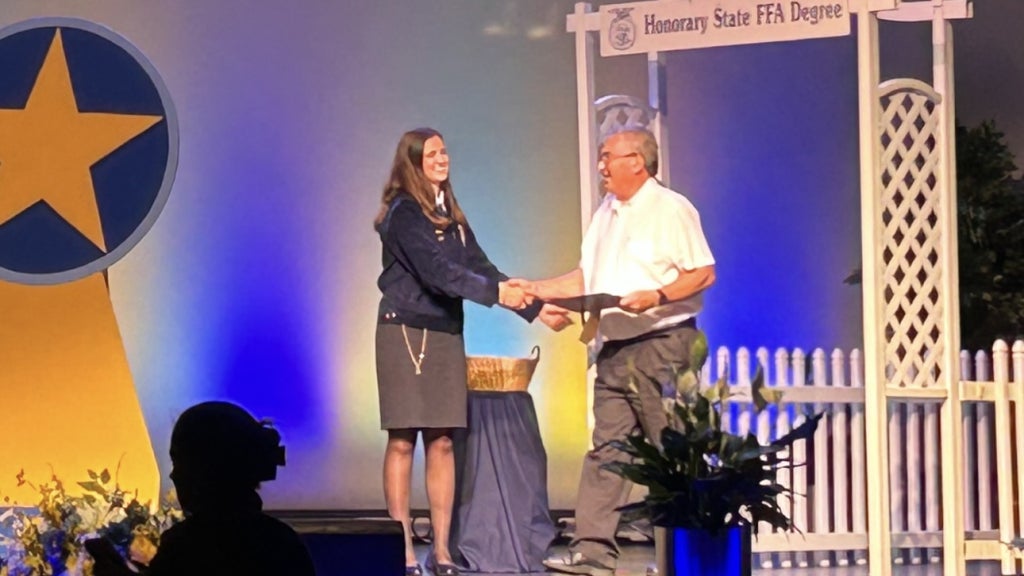 Gordon accepting his Honorary State FFA Degree.