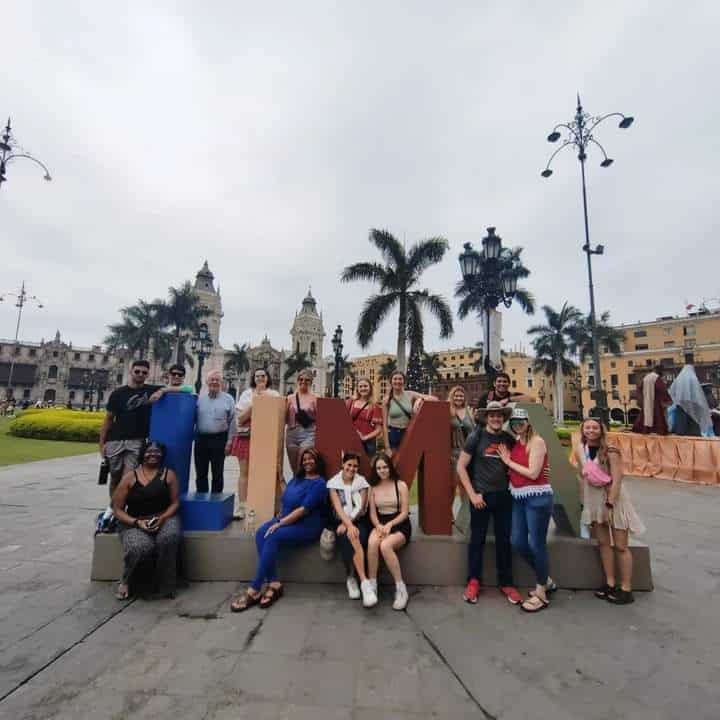 Study abroad class on the downtown square of Lima, Peru, and