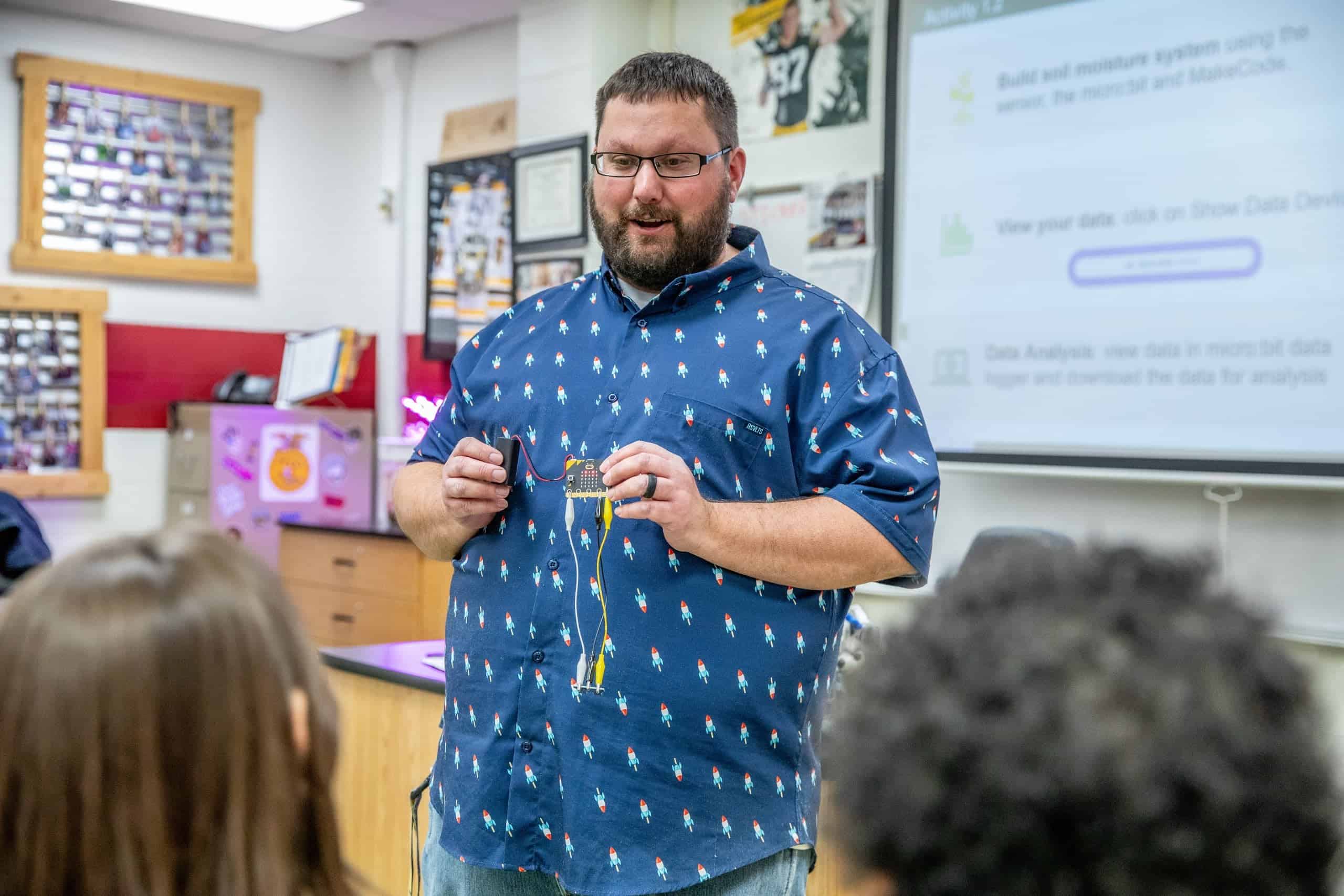 FFA Educator Demonstrates Agricultural Tool to Students
