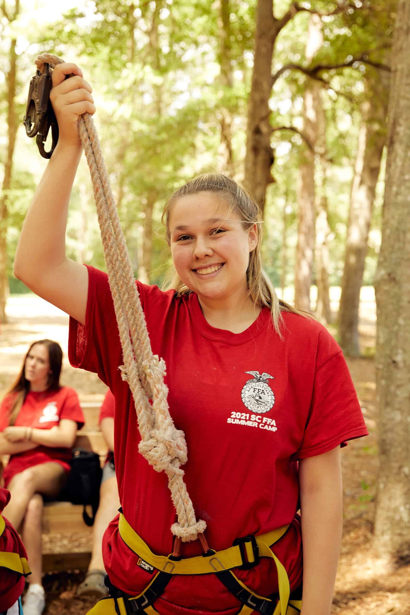FFA Student Demonstrates Rope Climbing at SC Camp