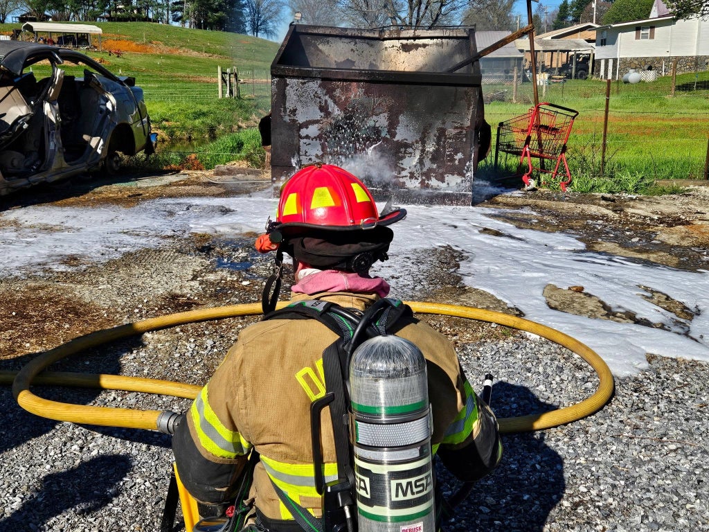 Thomas Murray, then a captain with Debusk Volunteer Fire Department, participates in the SoyFoam live fire demonstration.